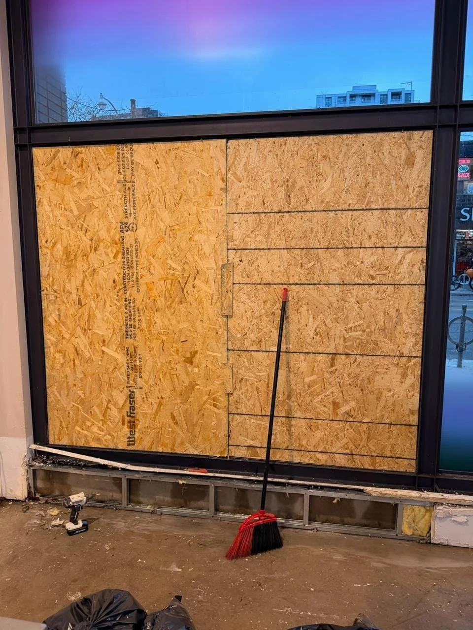 Commercial opening protected with temporary board-up