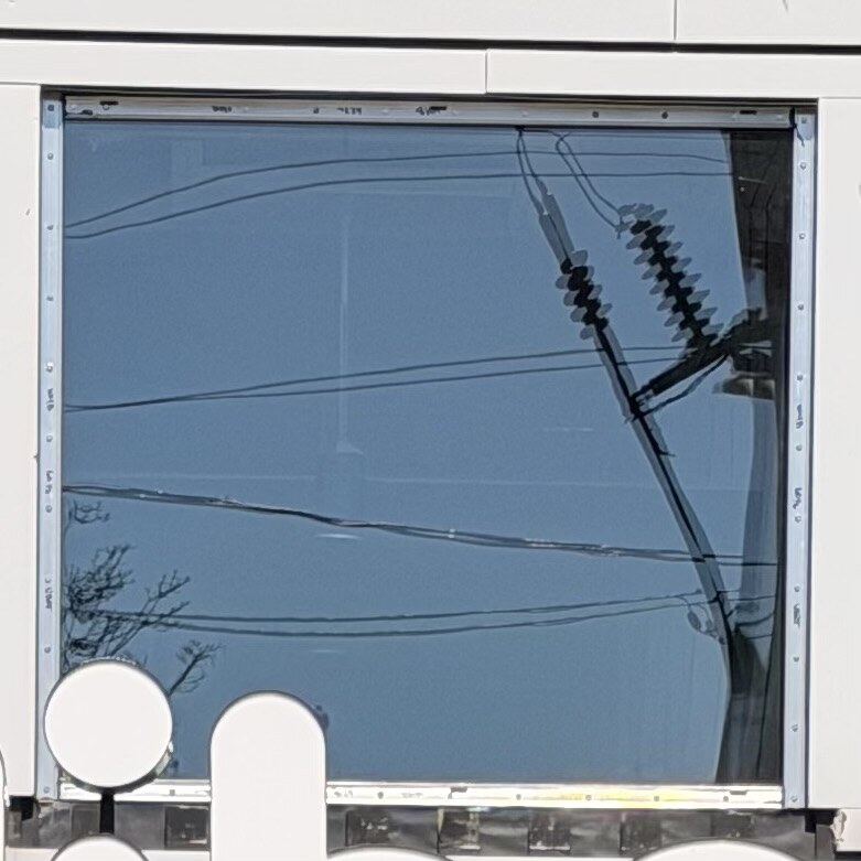 Restaurant storefront after glass repair in North York