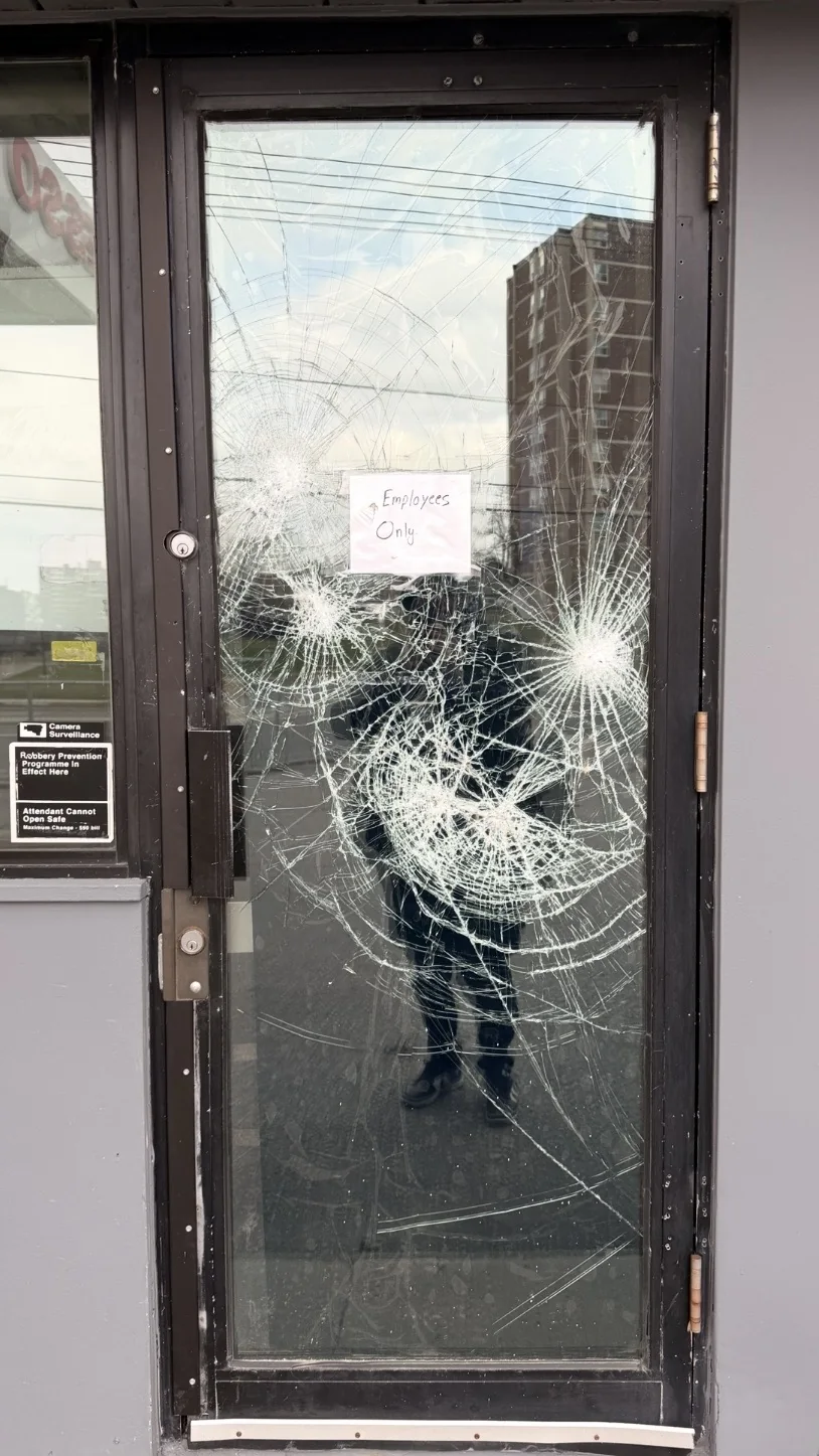 Commercial glass door before replacement